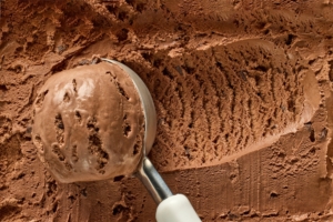 chocolate ice cream being scooped
